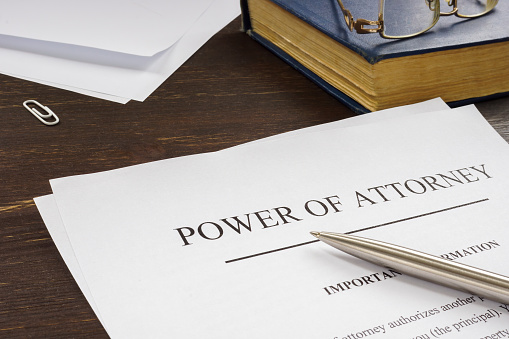 A legal professional in Tracy, CA, explaining power of attorney options to a client